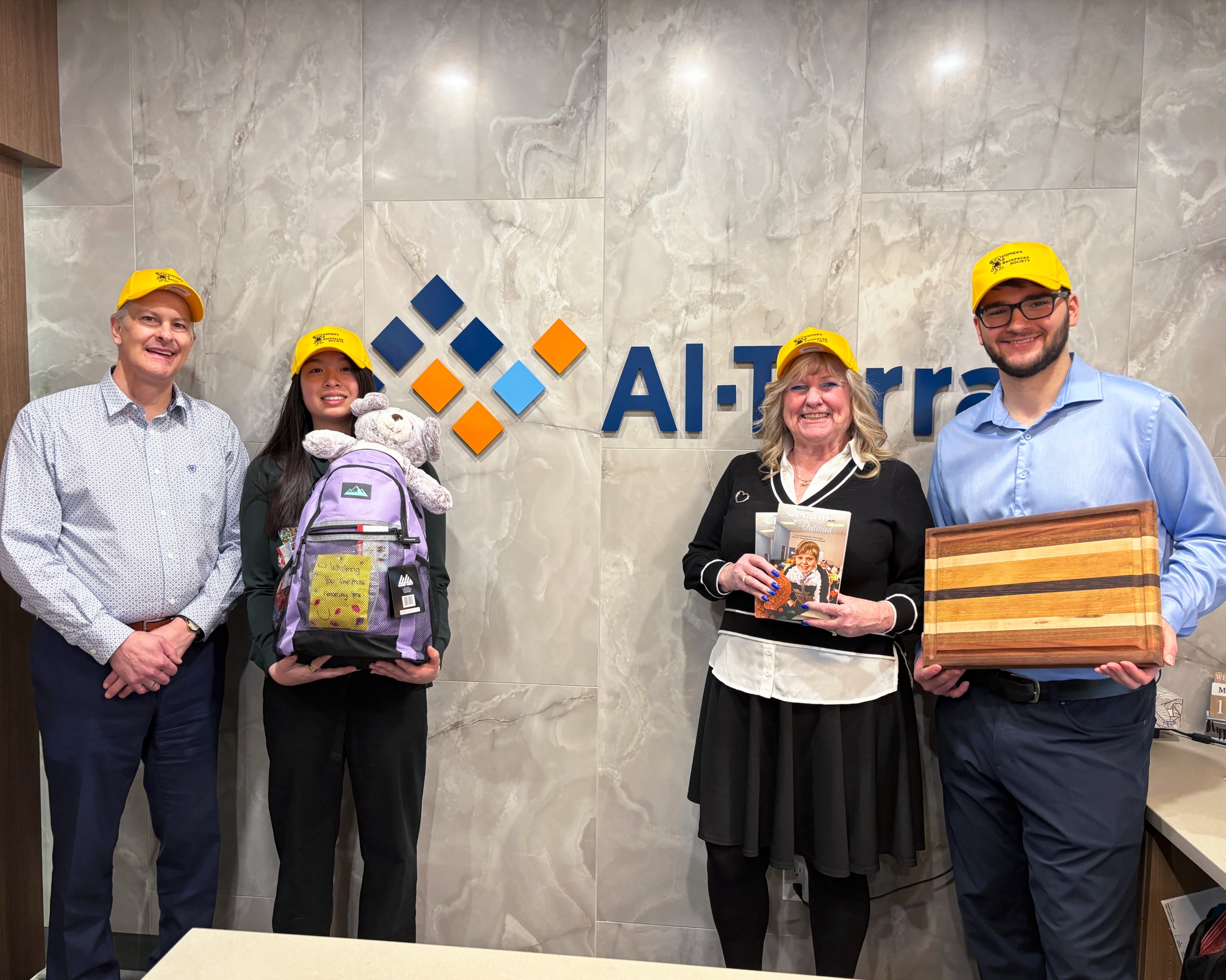 Left to right: Glen Thoman (Al-Terra), Jasmine Kwan (Al-Terra), Nancy McPhee (Stephen's Backpacks Society), Rylan Eberle (Al-Terra)